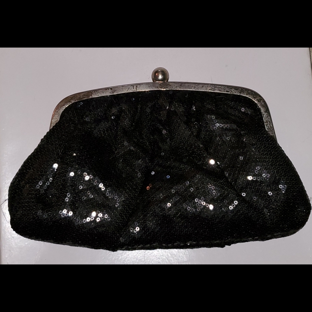 Alexia Crawford sequence flashy clutch